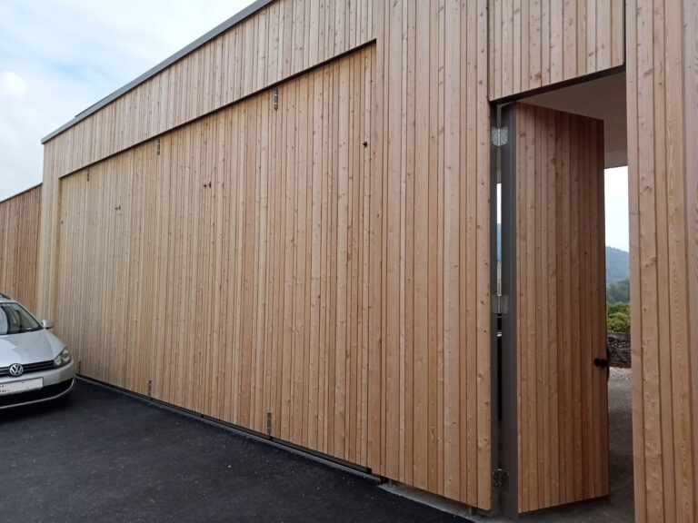 Individual Folding Door for a Private Villa’s Garage at Lake Attersee