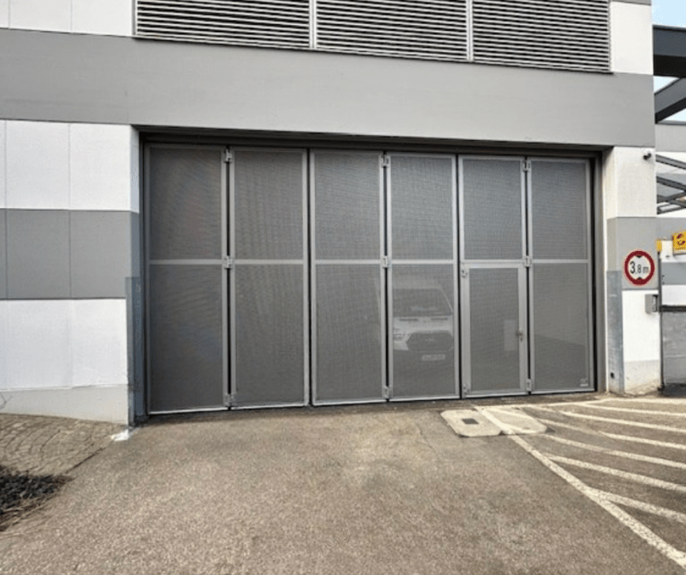 Doors with perforated sheet Infill for the Danau Shopping Center